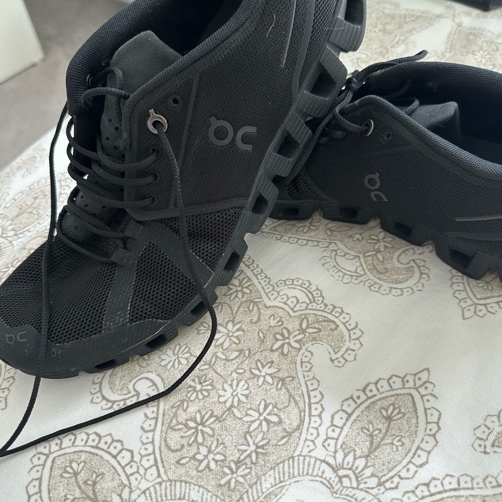 On Cloud Black Running Shoes - Rear View - Women’s